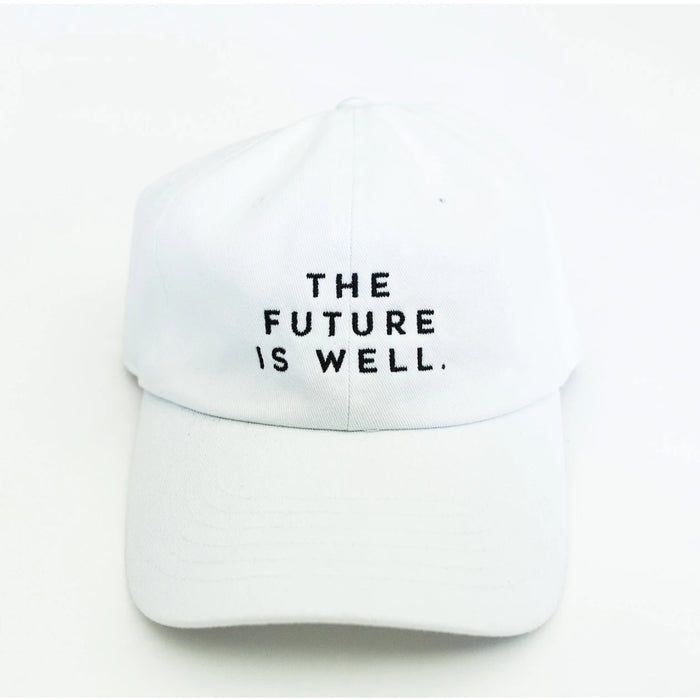 White dad hat with black embroidered text "THE FUTURE IS WELL." front centered, featuring the product title Wellness Month Dad Hat - Future is Well - White | Wellness Month