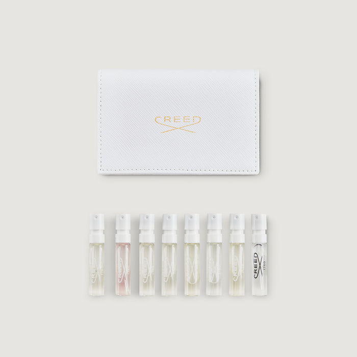 White Saffiano Leather Sample Wallet with 8 Women's Perfume Vials - Flat Lay | Creed Fragrances