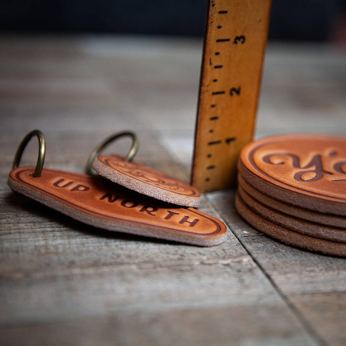 Up North leather keychains and coaster set
