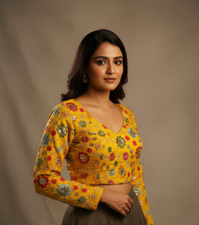 Yellow embroidered full sleeves blouse
